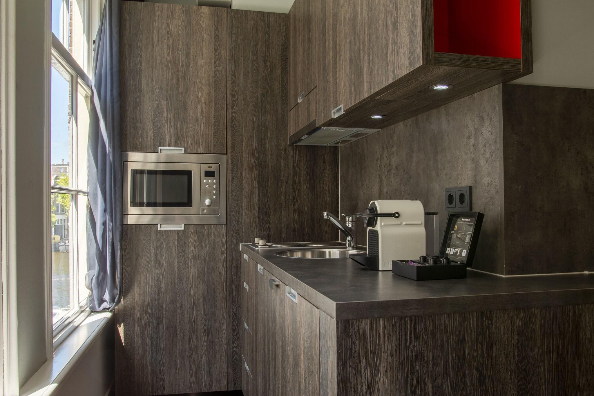 Imagem da galeria de Eden Studios And Apartments