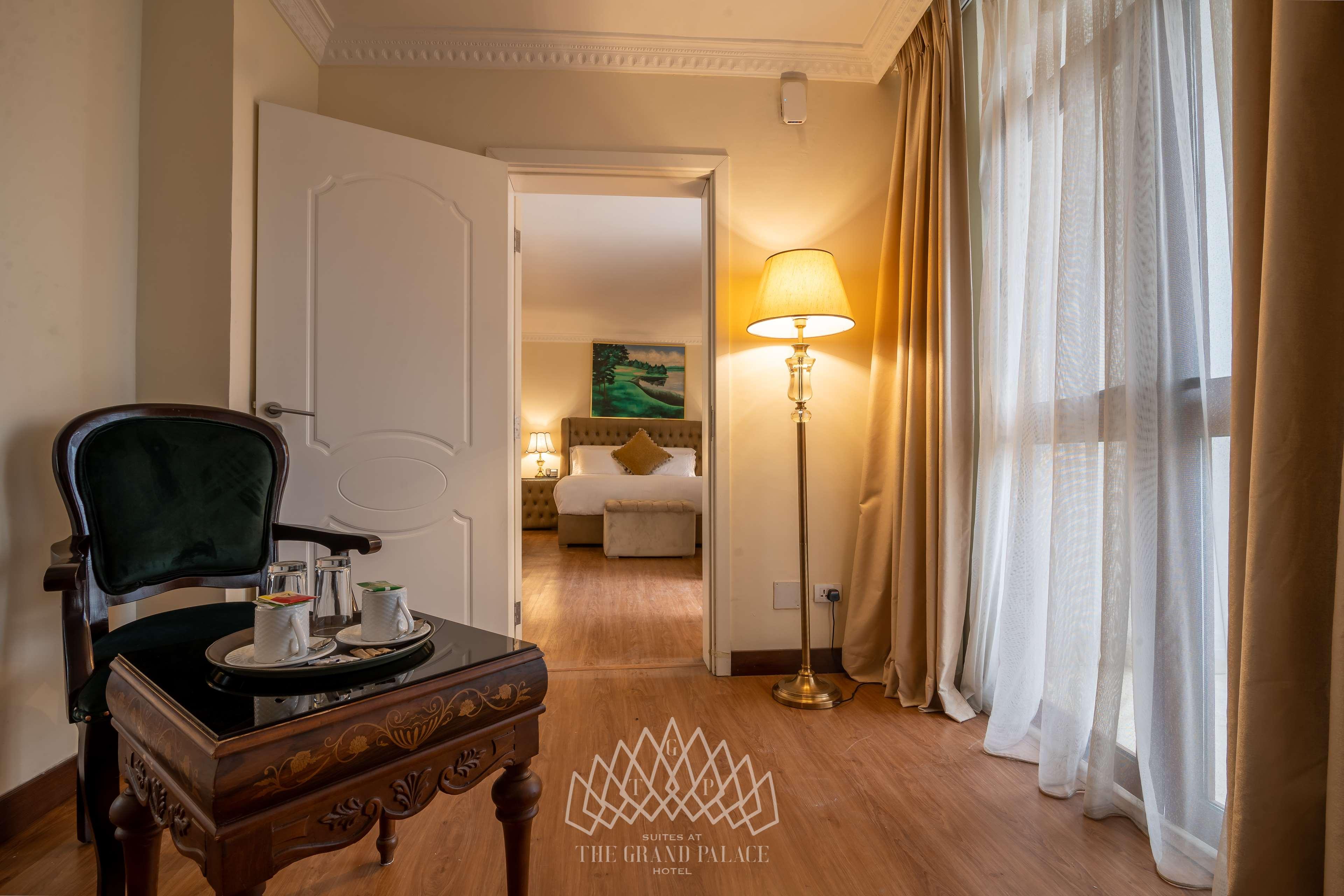 Suites At The Grand Palace Hotel