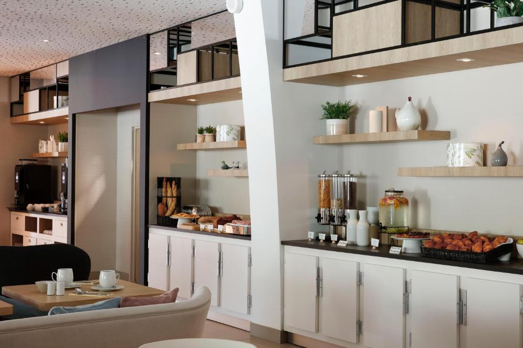 Hilton Garden Inn Paris La Villette - attēls