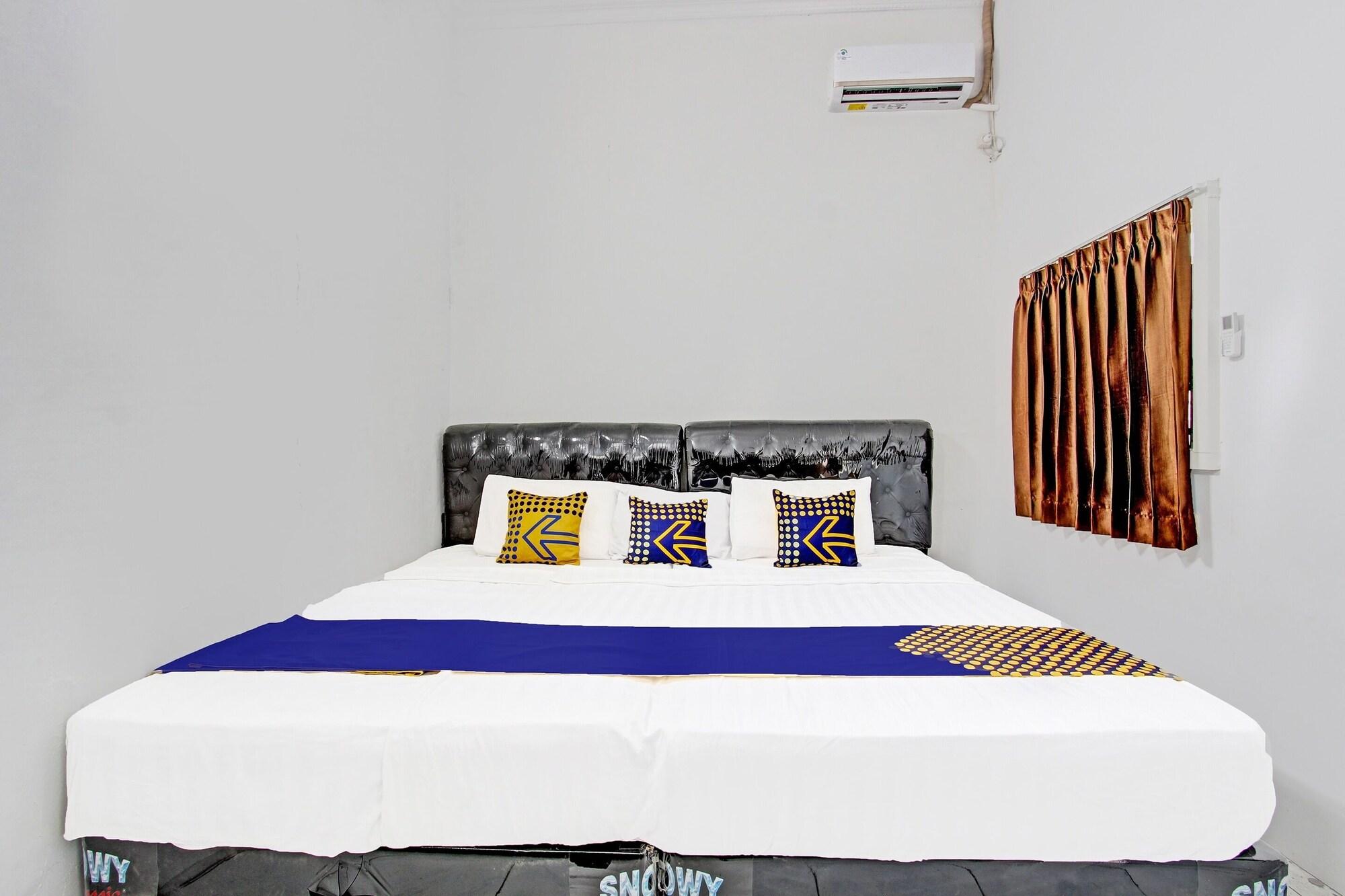 Spot On 91523 Kenari Guesthouse