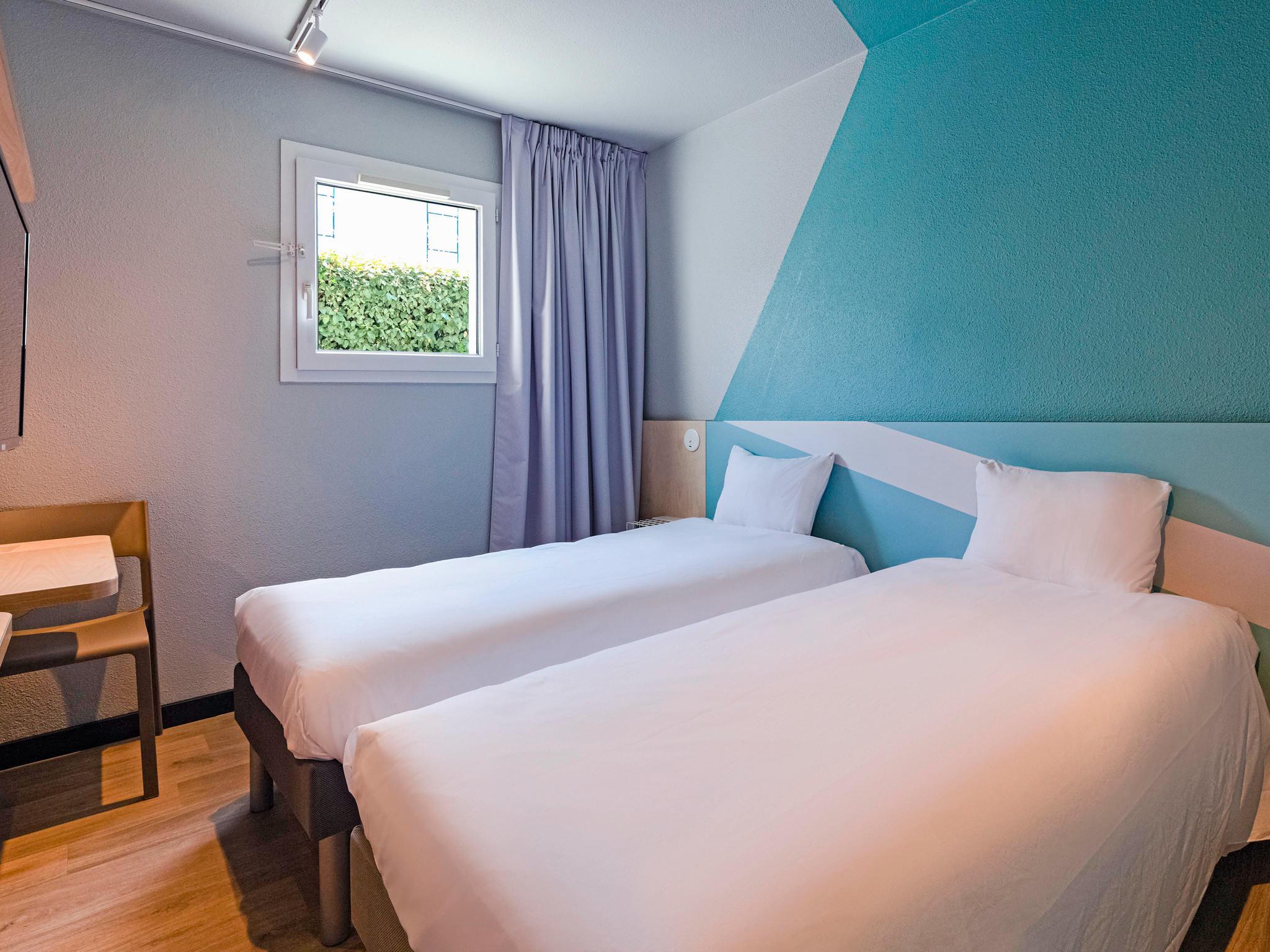 Chambre avec 2 lits