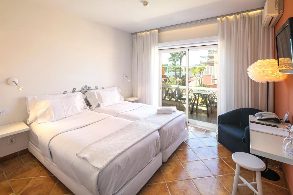 Imagem da galeria de Costa D'Oiro Ambiance Village
