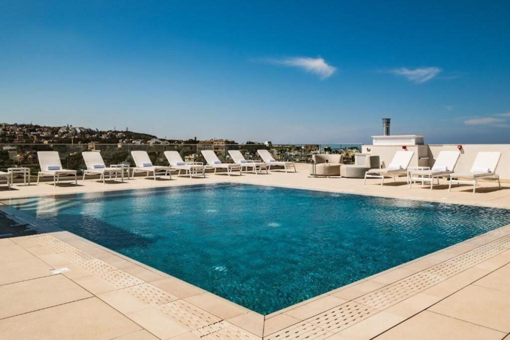 Ac Hotel By Marriott St Julian S — property photo 1