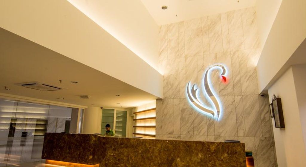 Flamingo By The Lake