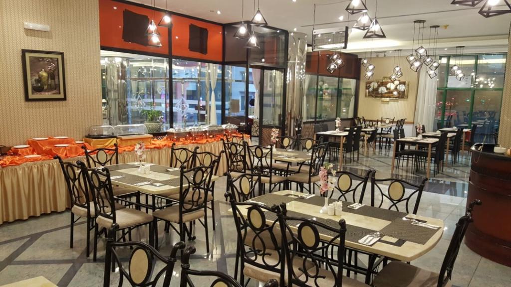 West Zone Pearl Hotel Apartments - Restaurant
