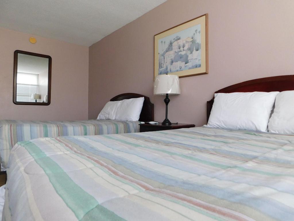 Apm Inn & Suites