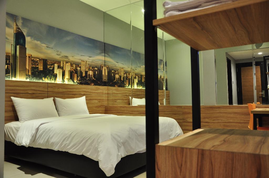 Orange Inn Hotel Mangga Besar by ZUZU