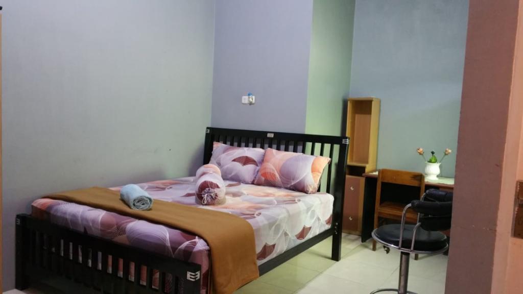 The Carstensz Homestay by ZUZU