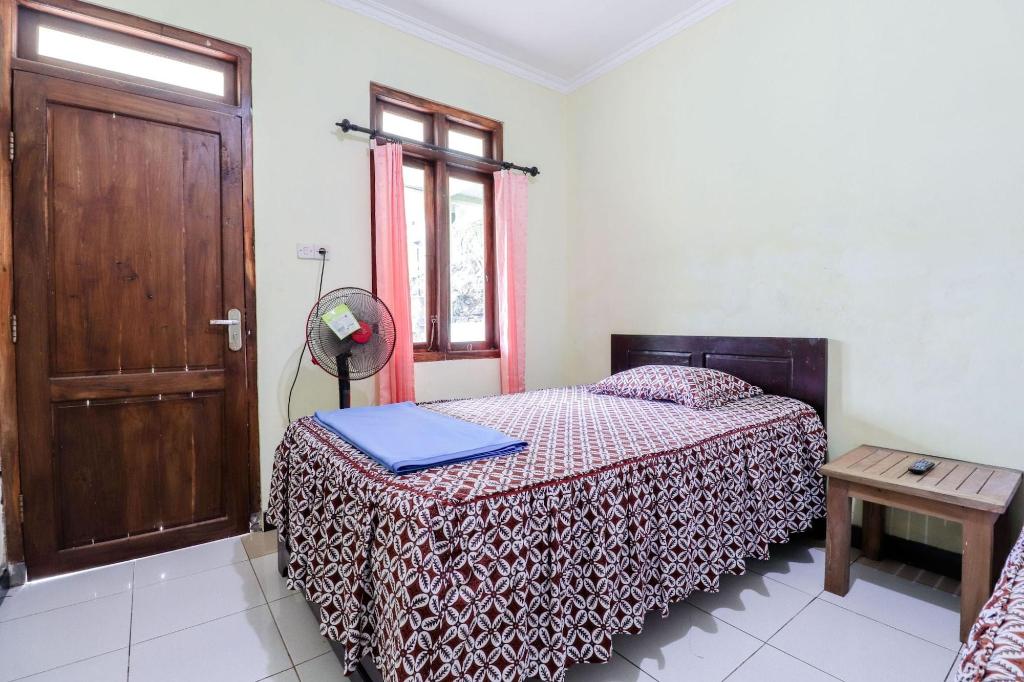 Rock Garden Homestay & Resto by ZUZU
