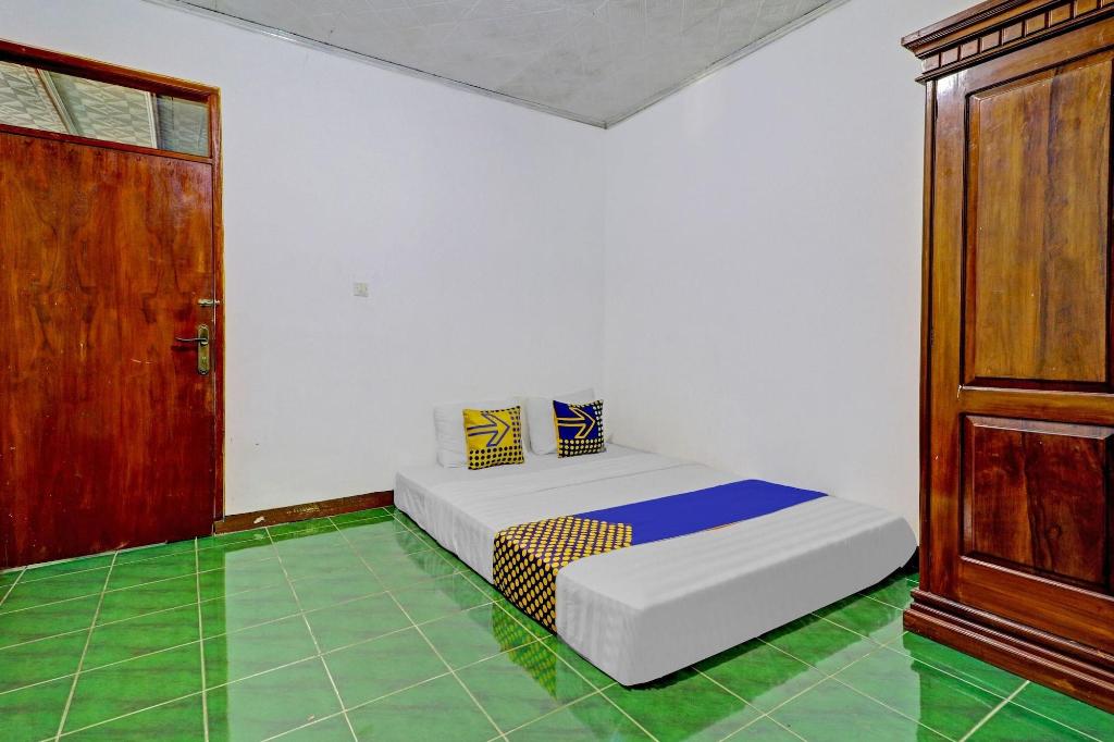OYO Homes 90849 Cibeunying Homestay Cibodas Mariba