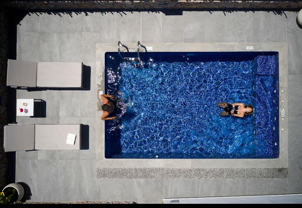 Sea Breeze Santorini Beach Resort, Curio Collection b Hilton photo 20