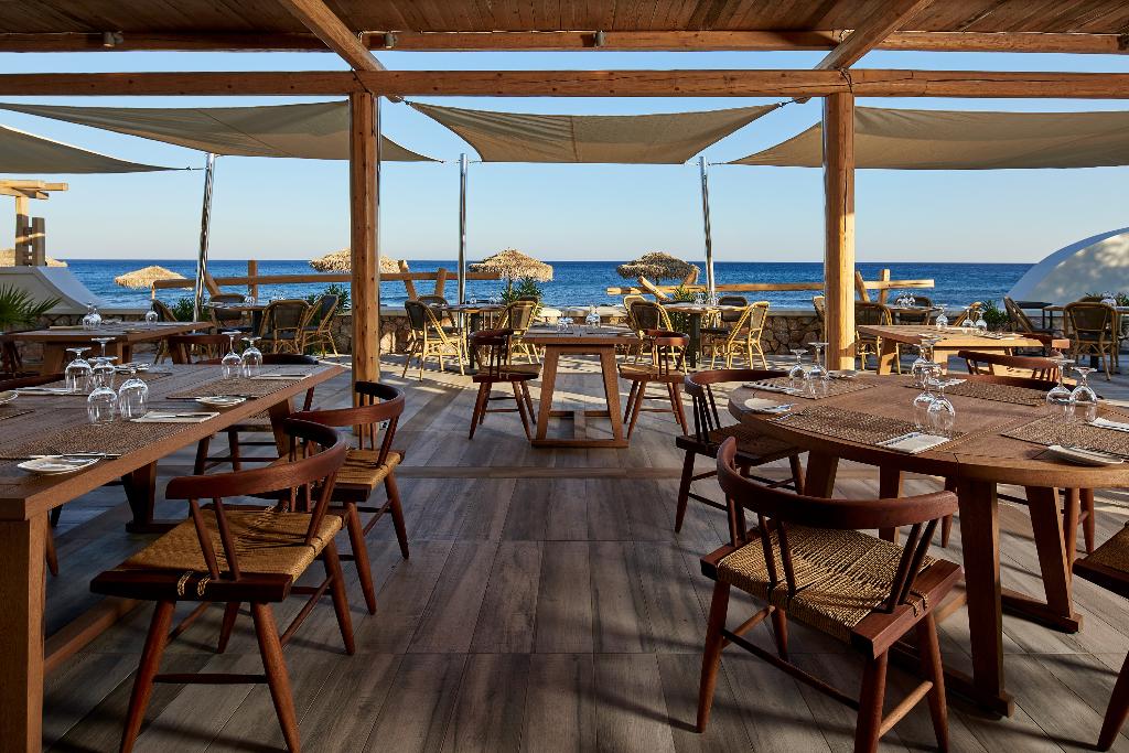 Sea Breeze Santorini Beach Resort, Curio Collection b Hilton photo 132