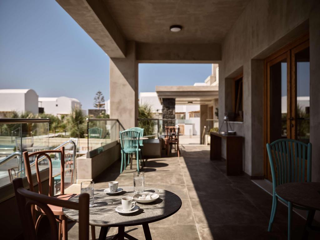 Sea Breeze Santorini Beach Resort, Curio Collection b Hilton photo 117