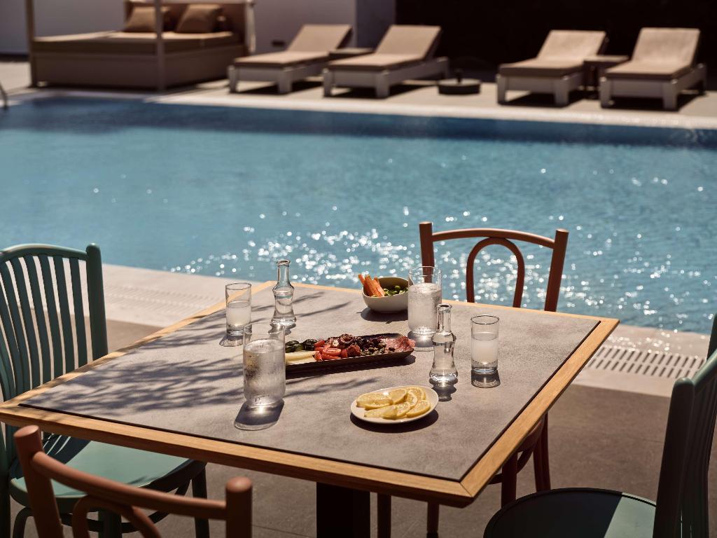 Sea Breeze Santorini Beach Resort, Curio Collection b Hilton photo 81