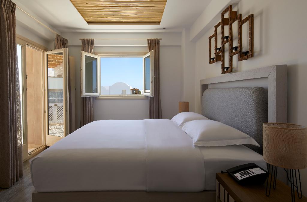 Sea Breeze Santorini Beach Resort, Curio Collection b Hilton photo 320