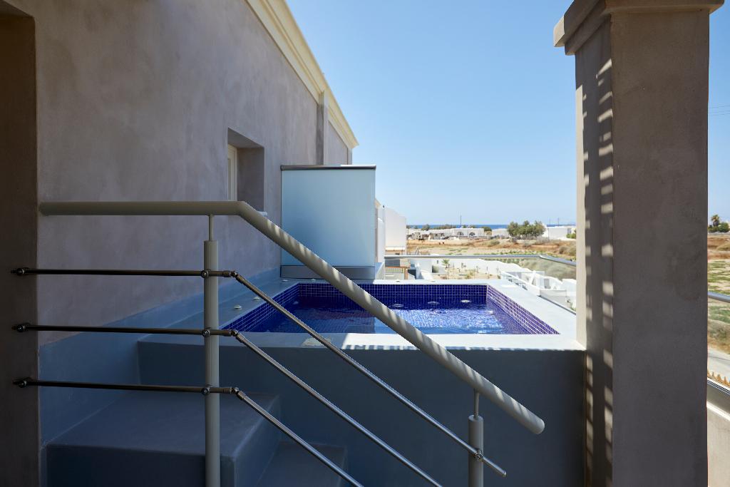 Sea Breeze Santorini Beach Resort, Curio Collection b Hilton photo 472