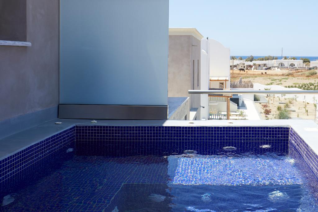 Sea Breeze Santorini Beach Resort, Curio Collection b Hilton photo 442