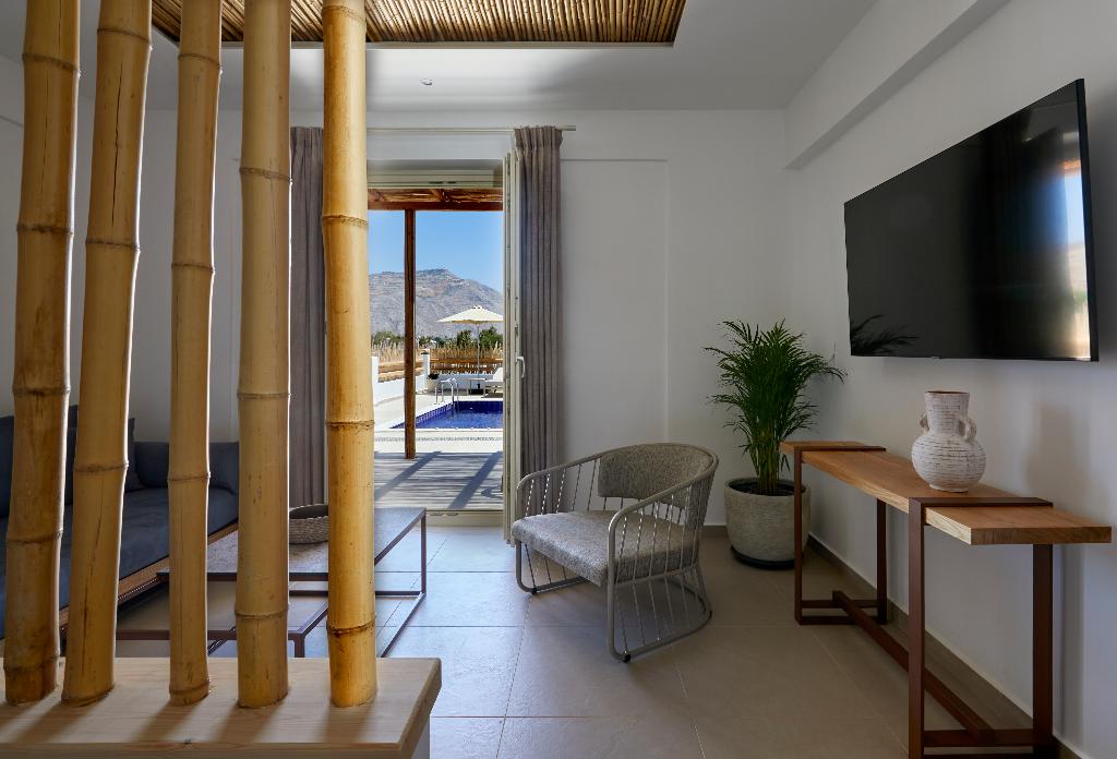 Sea Breeze Santorini Beach Resort, Curio Collection b Hilton photo 122