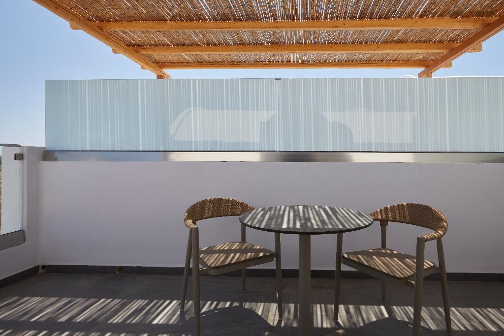 Sea Breeze Santorini Beach Resort, Curio Collection b Hilton photo 161