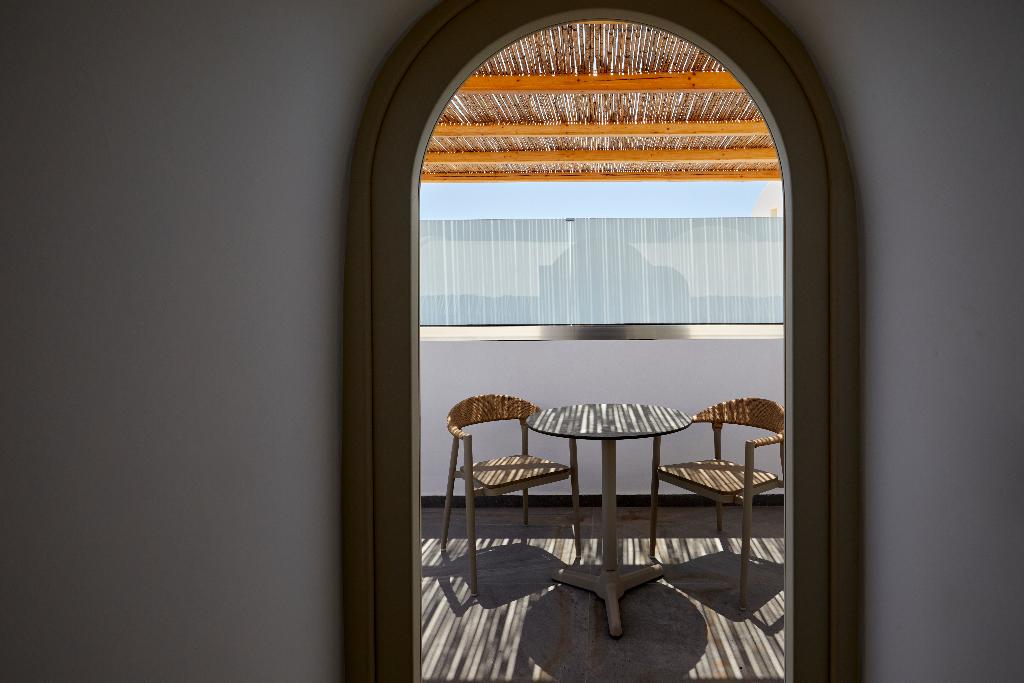 Sea Breeze Santorini Beach Resort, Curio Collection b Hilton photo 156