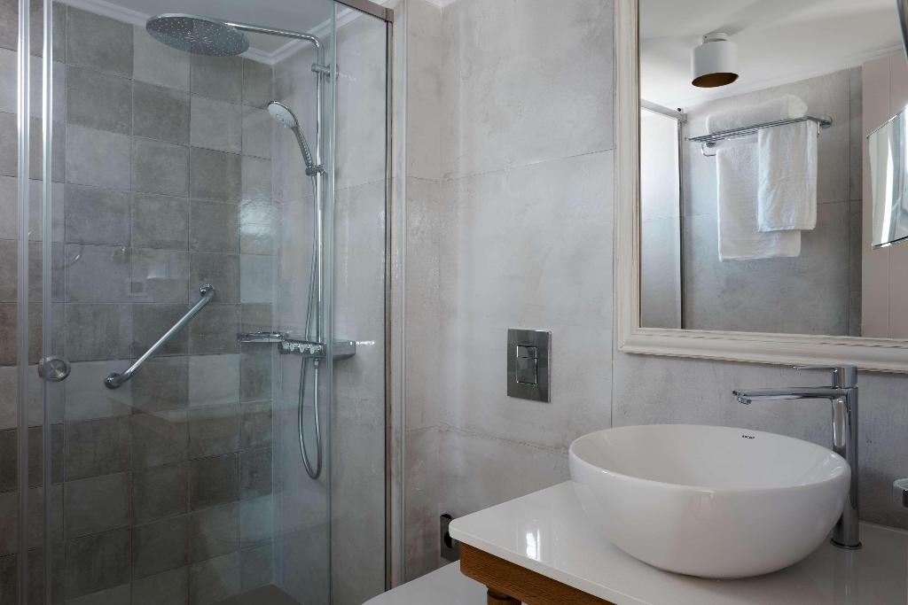 Sea Breeze Santorini Beach Resort, Curio Collection b Hilton photo 152