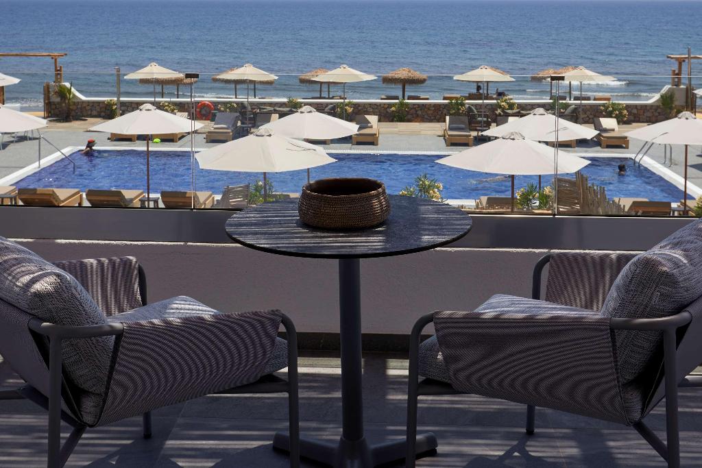Sea Breeze Santorini Beach Resort, Curio Collection b Hilton photo 171