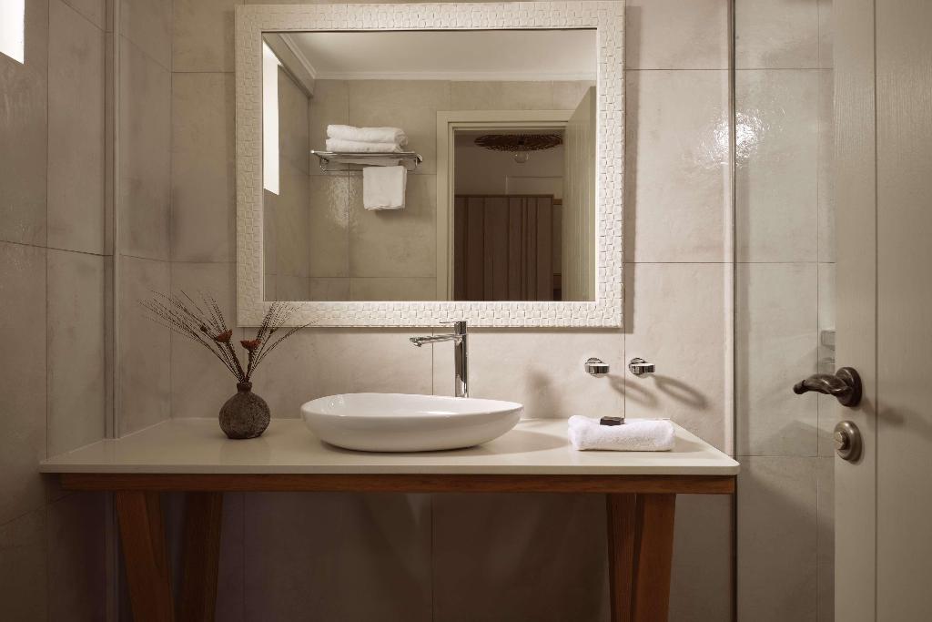 Sea Breeze Santorini Beach Resort, Curio Collection b Hilton photo 332