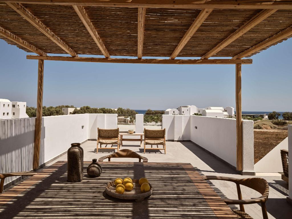 Sea Breeze Santorini Beach Resort, Curio Collection b Hilton photo 12