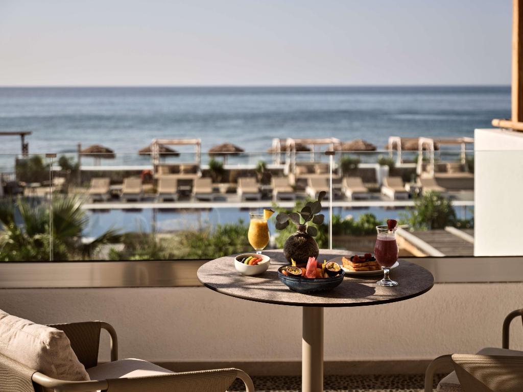 Sea Breeze Santorini Beach Resort, Curio Collection b Hilton photo 23