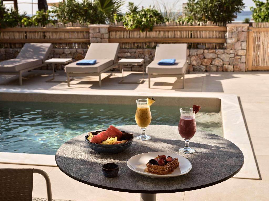 Sea Breeze Santorini Beach Resort, Curio Collection b Hilton photo 25