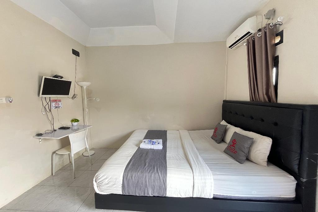 Steze Guesthouse Syariah Telanaipura by ZUZU